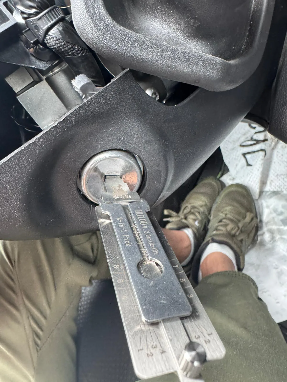 A Plus Locksmith repairing a door lock